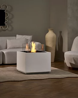 EcoSmart Fire’s Sidecar 24 ethanol fire table anchors an indoor lounge with fluid-concrete finish, delivering modern designer heat for residential entertaining.