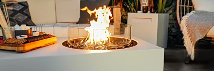 EcoSmart Fire Tequila 50 Fire Table creates a stylish outdoor centrepiece for a private residence courtyard with clean-burning ethanol flames.