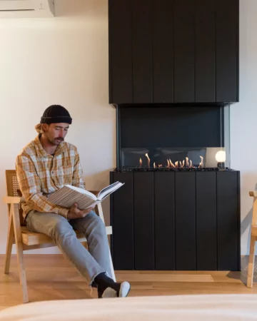 EcoSmart Fire Flex 32BY Flex Fireplace delivers efficient residential heating to EcoHut with a sleek built-in ethanol fireplace.