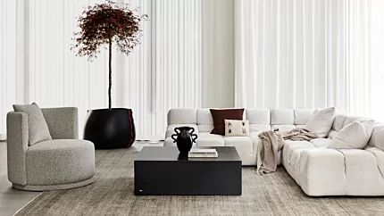 Blinde Design Bloc 40 concrete coffee table grounds a private residence living room with a minimalist modern centrepiece.
