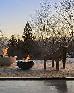 EcoSmart Fire Mix Series Fire Pit creates a contemporary focal point in this private residence outdoor patio with clean ethanol flames.