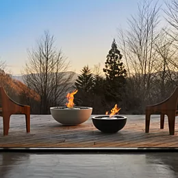 EcoSmart Fire Mix Series Fire Pit creates a contemporary focal point in this private residence outdoor patio with clean ethanol flames.