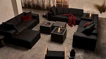 EcoSmart Fire Chaser 38 Fire Table brings a graphite concrete ethanol flame to a residential patio, creating a stylish outdoor centrepiece.