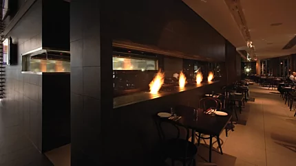 EcoSmart Fire BK5 Ethanol Burner delivers clean ventless flame to Hurricanes Grill & Bar Sydney restaurant interior.