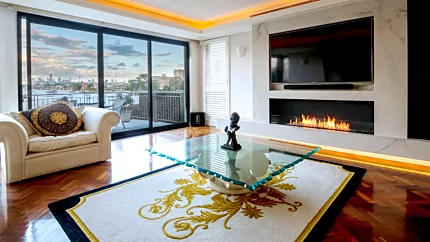 EcoSmart Fire Flex 68SS single sided ethanol fireplace anchors an indoor living room in Drummoyne residence, ventless heat.