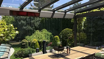 Heatscope Vision 3200W Radiant Heater wall-mounted on a private terrace, providing sleek energy-efficient outdoor heat.